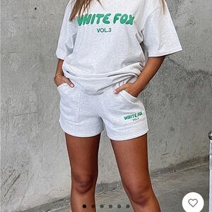 White fox boutique shorts size xs. Brand new. Gray with green print.